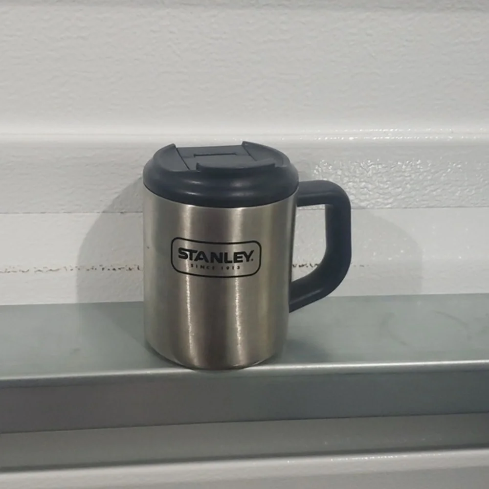 12 ounce‎ Stanley brand metal coffee cup with screw on lid